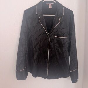 Black satin Victoria’s Secret pajamas, long sleeved buttons size Medium.